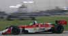 Sebastien Bourdais in Action at Dusk Thumbnail