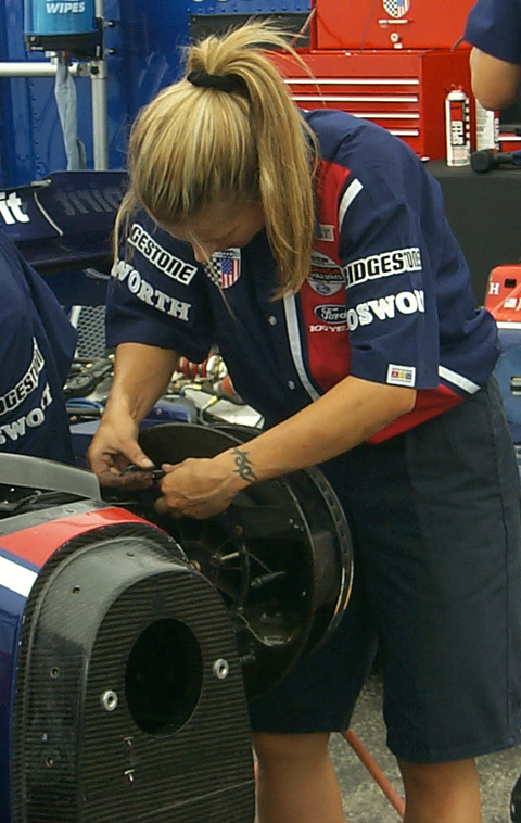 Tess Brelia Working on Car