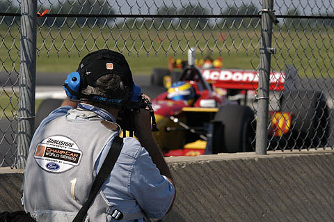 Sebastien Bourdais in Action Through Worker Hole