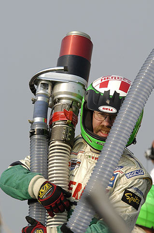 Crew Member Getting Fuel Hose Ready