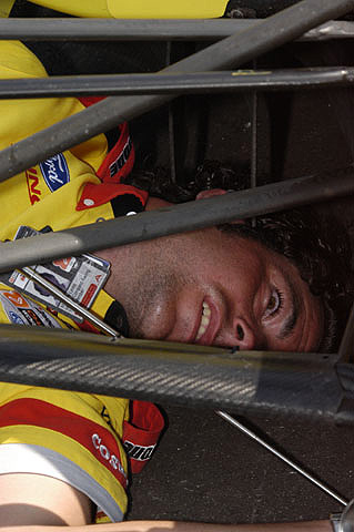 Crew Member Behind Suspension Bars