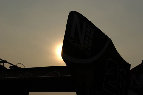 Sun Setting Behing Car Rear Wing