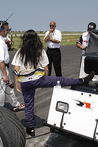 Danica Patrick Stretching on Pit Cart