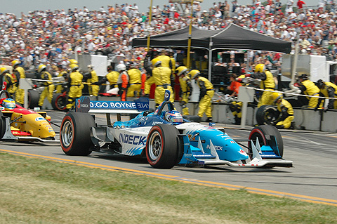 Paul Tracy Ahead of Sebastien Bourdais Exiting Pits