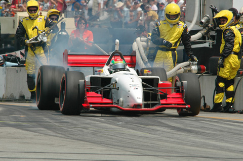 Justin Wilson Peels Out of Pit Stall