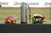 Fire Helmets and Extinguisher On Pit Wall Thumbnail