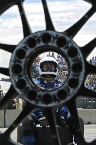 Crewman Seen Through Center of Wheel