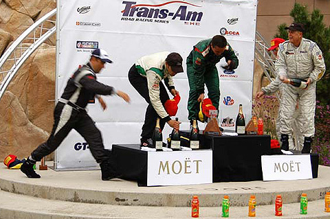 Podium Winners Going For Champagne Bottles