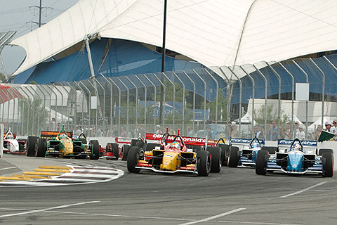 Field Heads Into First Turn on First Lap