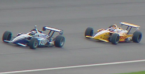 Dario Franchitti passing Jimmy Vasser