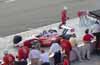 Scott Dixon Pulling Out Of Pits Thumbnail