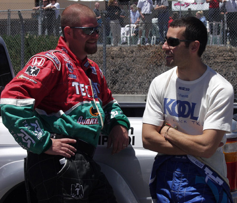 Dario Franchitti Talking to Crew Member