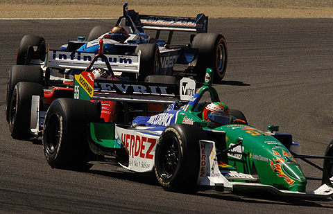 Three Cars Racing Nose to Tail