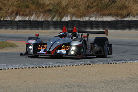 Oreca FLM09 LMPC Driven by Scott Tucker, Christophe Bouchut, and Mark Wilkins in Action