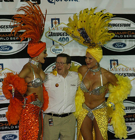 Carl Haas w/Showgirls on Podium