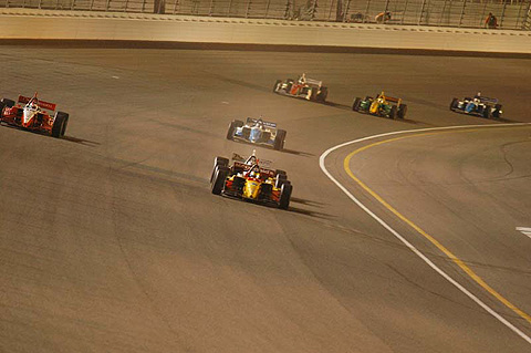 Oriol Servia Tucks In Behind Sebastien Bourdais On Lap Four