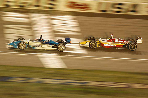 Paul Tracy Leads Sebastien Bourdais Crossing Start/Finish Line