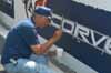 Crew Member Painting The Pit Wall Thumbnail