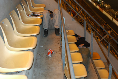 Fan Sleeping in Stands