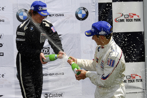 James Kovacic Spraying Sparkling Juice on Podium