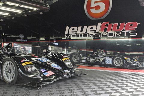 HPD ARX-03b LMP2 Reflected in Team Hauler Driven by Scott Tucker and Luis Diaz