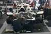 Muscle Milk Crew Working on HPD ARX-03a in Paddock Thumbnail