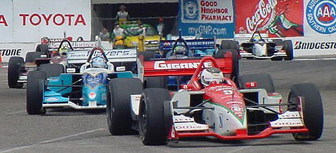 Michel Jourdain Leads Pack of Cars