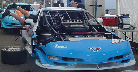 Crew Member Leaning Into Randy Ruhlman Car