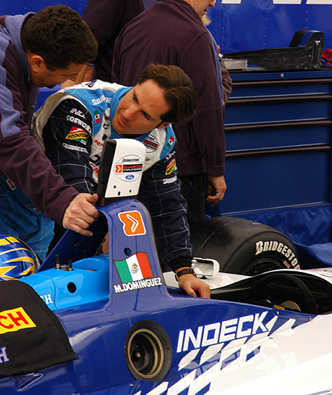 Mario Dominguez Looks Over Car