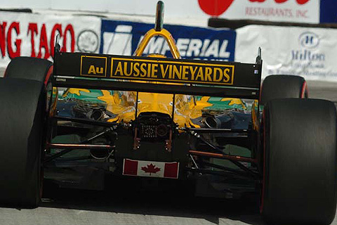 Alex Tagliani w/Canadian Flag on Rear of Car