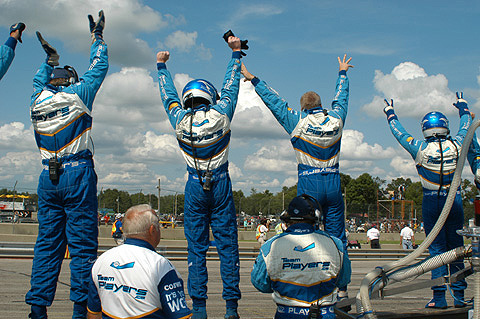 Player's Crew Celebrating on Pit Wall
