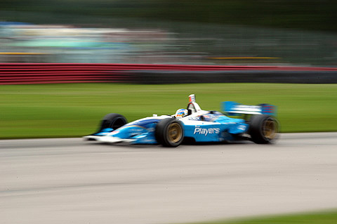Blur Effect Shot of Paul Tracy in Action