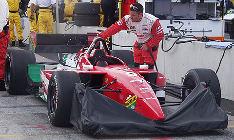 Crew Working On Michel Jourdain Car