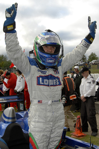 Adrian Fernandez Raises Arm in LMP2 Celebration