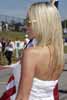 Backside of Girl in Shoulder Baring White Dress Thumbnail