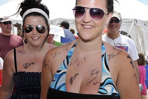Two Female Fans With Autographs on Their Body