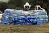 Two Fans Sitting in Kiddie Pool Keeping Cool Thumbnail