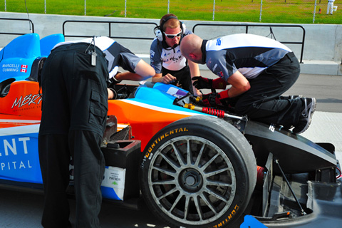 Crew members making adjustment to LMPC #8