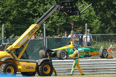 James Davison's Damaged Car Lifted Off Track