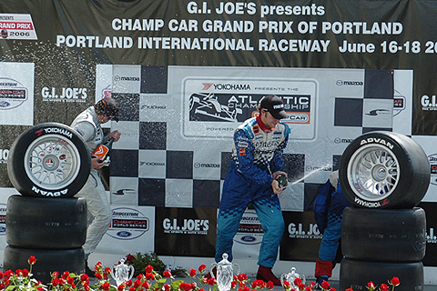 Hinchcliffe Spraying Wirth on Podium