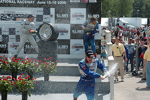 Hinchcliffe Running Spraying Champagne