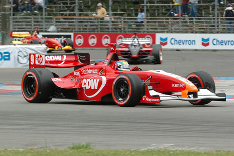 Justin Wilson Leads Robert Doornbos and Sebastien Bourdais