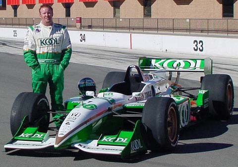Paul Tracy Standing by Car