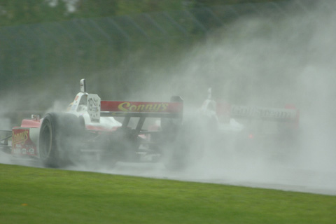 Two Cars in Heavy Rain