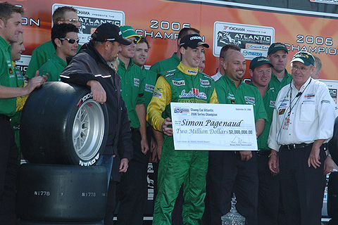 Simon Pagenaud Holding Up Check