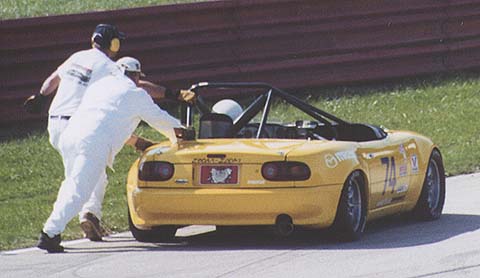 EP Miata Being Pushed By Workers