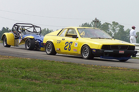 David Strittmatter in FP Lancia Scorpion Leading Eric Prill in FP Lotus Super 7