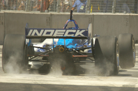 Paul Tracy's Front Wheels Bouncing Over Trolley Tracks