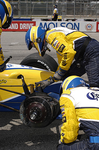 Crew Checking Damage on Rodolfo Lavin's Car