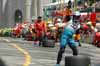 Crew Waving Their Drivers Into The Pit Box Thumbnail